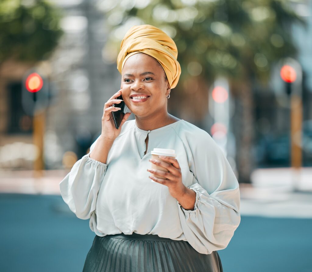 Phone call, city and business African woman for contact, networking and connection in urban town. T